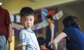 Qingyuan, China - June 23, 2016: Sad little Chinese boy