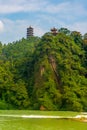 Qinyan Tower at Dujiangyan ancient irrigation system during early autumn at Dujiangyan Sichuan , China : 22 October 2023