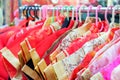 Qipao Chinese dress for kids hanging on a clothes line