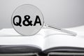 QnA, q and a concept. Questions and answers on book Royalty Free Stock Photo