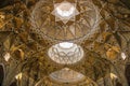 Details of the decorations of the magnificent Iranian Persian Mosque Fatima Masumeh Shrine in gold colour