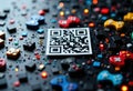 QR code on game board surrounded by colorful controller pieces and LEDs Royalty Free Stock Photo