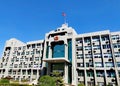 Government building with national flag and emblem @ China