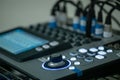 Qsc touchmix 16 professional audio digital mixer in a recording studio