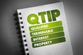 QTIP - Qualified Terminable Interest Property acronym on notepad, concept background Royalty Free Stock Photo