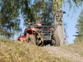 Quad bike on the hill near the autumn forest. Royalty Free Stock Photo