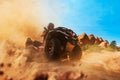 Quad bike rider climbing the sands, front view Royalty Free Stock Photo