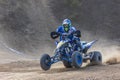 Quad bike rider in the race closeup Royalty Free Stock Photo