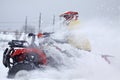 The quad bike's driver rides over snow track Royalty Free Stock Photo