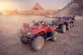 Quad bikes ATV safari in desert background Pyramids Sphinx Cairo, Egypt Royalty Free Stock Photo