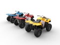 Quad bikes in primary colors - red, blue and yellow Royalty Free Stock Photo