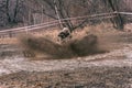 Quad competition. Man driving quad during the race among mud. Royalty Free Stock Photo