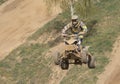 Quad racer is high jumping. Horizontally. Royalty Free Stock Photo