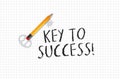 Quad or squared white paper with pencil key and message Key to success