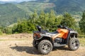 Quadbike in the mountains. ATV Royalty Free Stock Photo