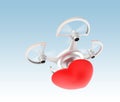 Quadcopter carrying heart mark for fast love message delivery concept