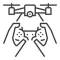 Quadcopter and Gamepad in Hands vector Drone concept line icon