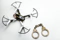 Quadcopter handcuffs white leather background