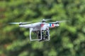 Quadcopter, quadrotor, drone on a green background.