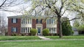 Quadplex Red Brick Building with Convex Paned Windows