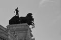 Quadriga statue on the roof of a building in Madrid