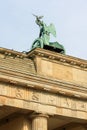 Quadriga statue on top of Brandenburg gate or Brandenburger Tor in summer Royalty Free Stock Photo