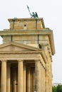 Quadriga statue on top of Brandenburg gate or Brandenburger Tor in summer Royalty Free Stock Photo