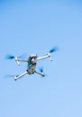 Quadrocopter in flight above the ground photo of the unit itself Royalty Free Stock Photo