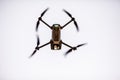 Quadrocopters with camera during flight in the sky Royalty Free Stock Photo