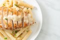 Quadrotto penne pasta white creamy sauce with grilled chicken Royalty Free Stock Photo