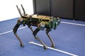 A quadruped military robot at walking position on display