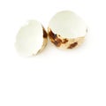 Quail egg shell cracked and isolated over white background Royalty Free Stock Photo