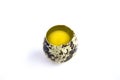 Broken quail egg on white background Royalty Free Stock Photo