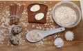 Quail eggs on a black bread and oat chips in a cup and cookie and a cinnamon stick and meringue Royalty Free Stock Photo