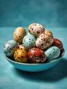 Quail eggs in a blue bowl on a blue background