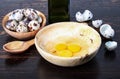 Quail eggs, bowl, broken eggs Royalty Free Stock Photo