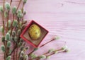 Quail eggs easter branch nature of a willow on a tradition wooden background celebrate