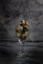 Quail eggs in glass on dark background Royalty Free Stock Photo