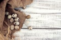 Quail eggs on rustic wooden background. Top view