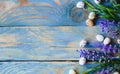 Quail eggs and sage flowers on a worn blue wooden table. Flat layout with copy space Royalty Free Stock Photo