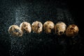 Quail eggs in splashes of water on a black background Royalty Free Stock Photo