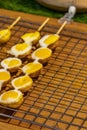 Quail eggs on sticks Thai night market street food Bangkok Royalty Free Stock Photo