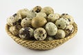 Quail eggs in a wicker oval shape