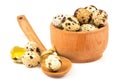 Quail eggs in a wooden bowl and spoon Royalty Free Stock Photo