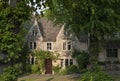 Quaint Cotswold romantic stone cottages on The Hill,  in the lovely Burford village, Cotswolds, Oxfordshire Royalty Free Stock Photo