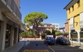 colorful quaint houses and narrow streets of the mediterranean town Caorle in the Adria (North Italy)