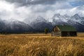quaint Moulton barn wintry autumn weather on snow capped Grand Teton national Park in Wyoming Royalty Free Stock Photo