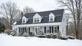 Quaint New England saltbox house in winter Royalty Free Stock Photo
