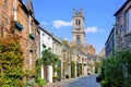 Quaint street with church spire in Edinburgh, Scotland