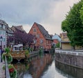 Quaint Village Scene with Canal in Alsace Region of France